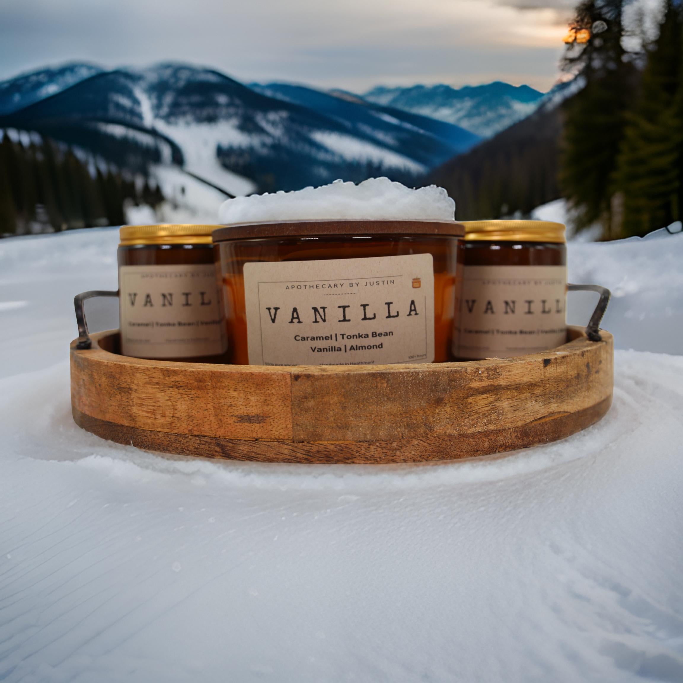 Vanilla Candle Collection with Additive-Free Home Fragrance set against a snowy mountain backdrop