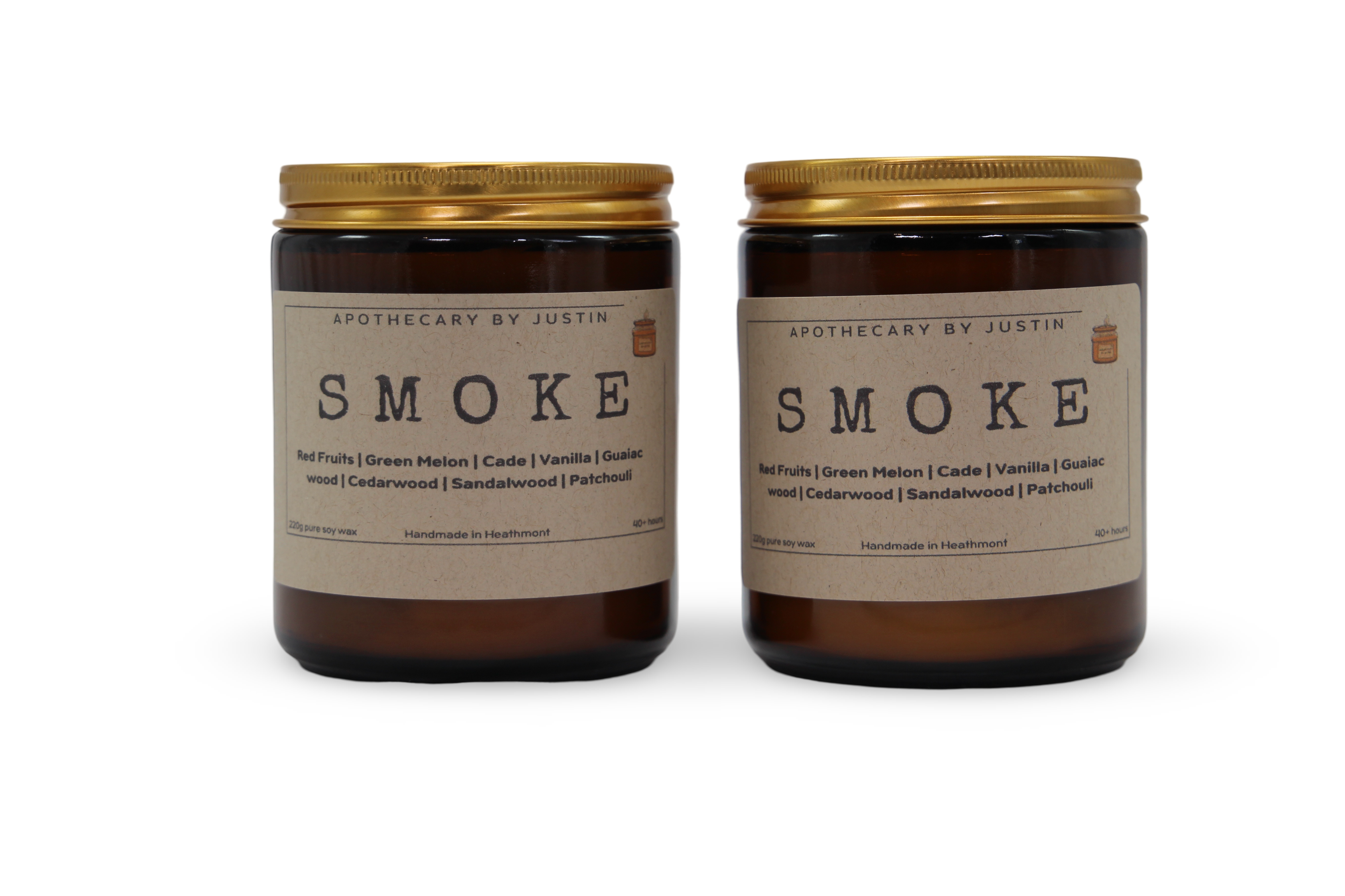 Two My Store additive-free soy wax candles in amber jars with golden lids, featuring smoky scents