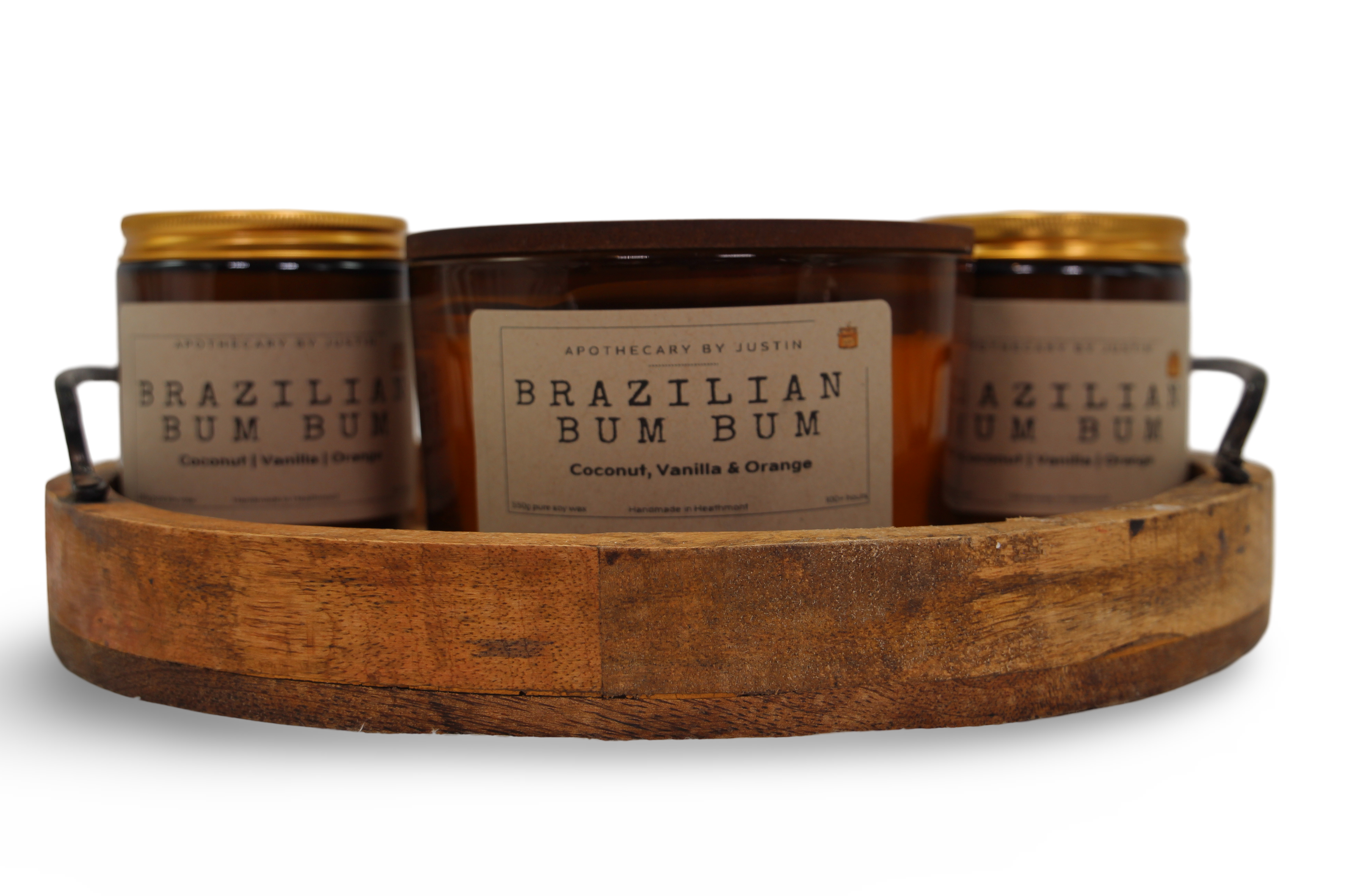 My Store pure fragrance candles in Coconut, Vanilla, and Orange scents beautifully arranged on a wooden tray
