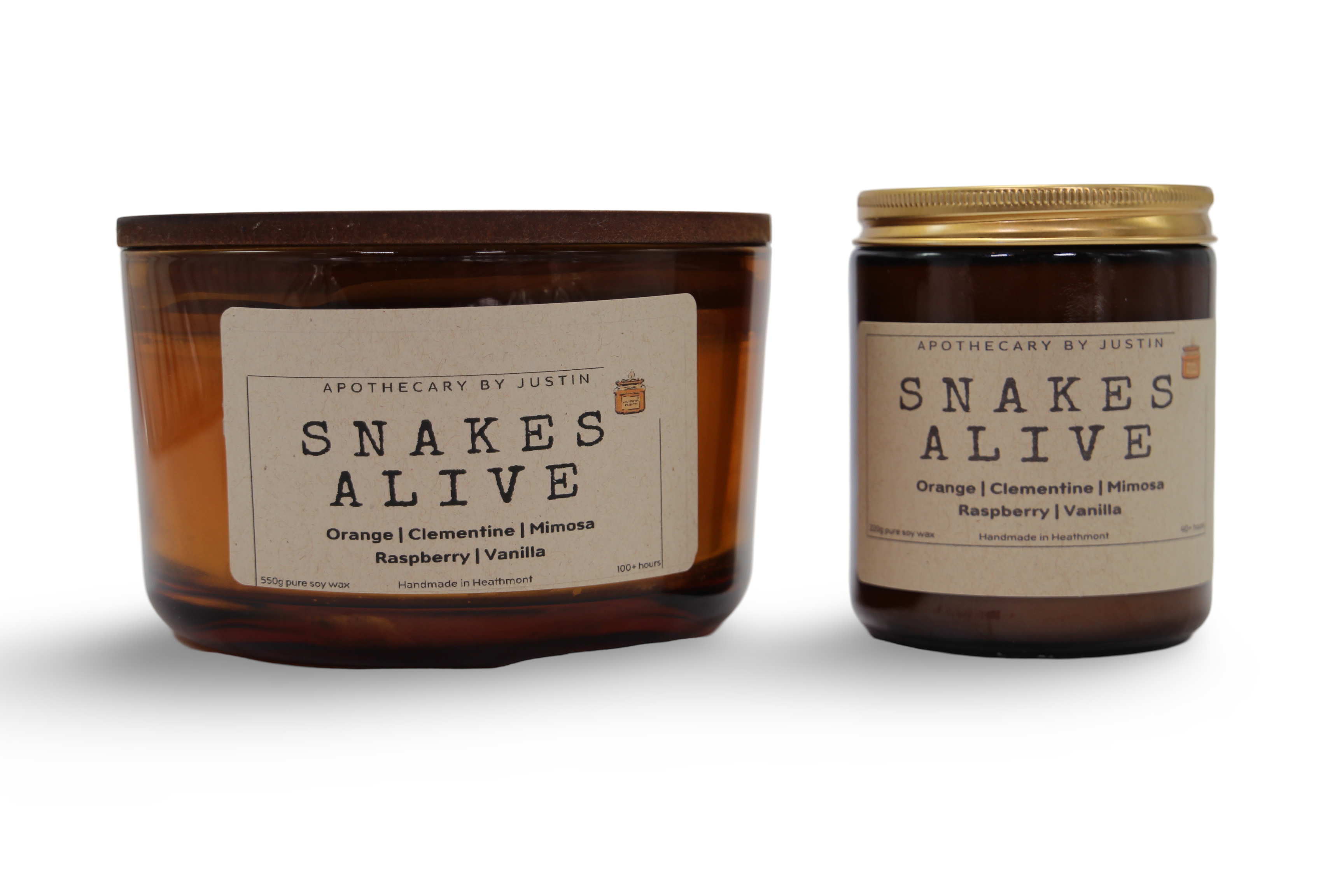 Vegan soy candle gift pack featuring Snakes Alive scents, including Orange, Clementine, and Raspberry Vanilla