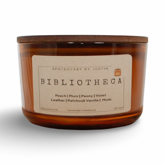 Bibliotheca luxury scented candle with peach and plum notes