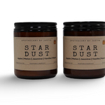 Additive-free candles in two jars labeled Stardust with apple, melon, jasmine, and vanilla fragrances