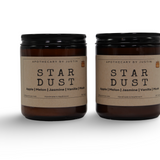 Additive-free candles in two jars labeled Stardust with apple, melon, jasmine, and vanilla fragrances
