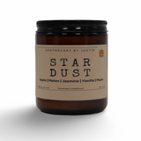 Star Dust Additive-Free Candles in amber jar with scents of apple, melon, jasmine, vanilla, and musk