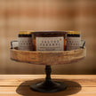 Set of three Salted Caramel Additive-Free Soy Candles in a decorative wooden display