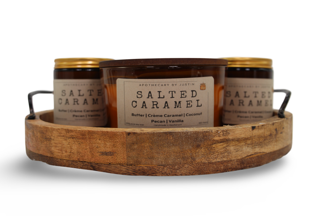 My Store Additive-Free Soy Candle in Salted Caramel scent surrounded by three jars in a wooden tray