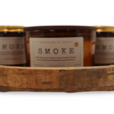 Collection of My Store additive-free soy wax candles in a wooden tray for a cozy atmosphere
