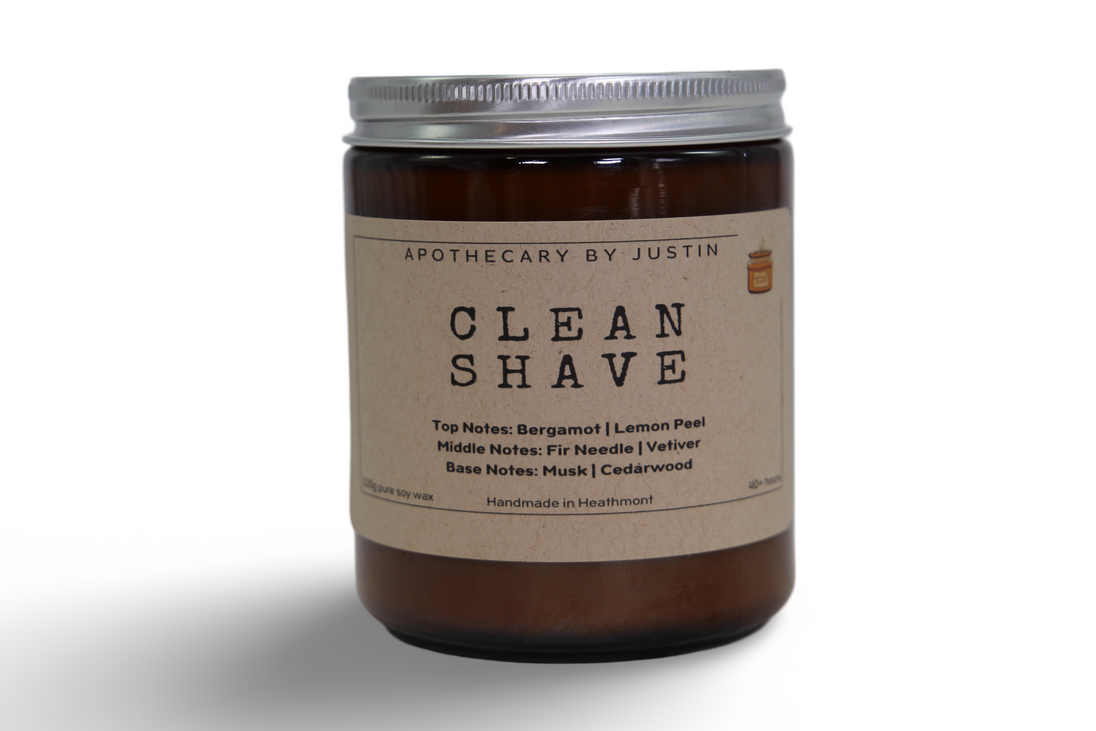 My Store bergamot lemon peel candle in a brown jar with a clean shave label and natural scent notes