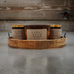 Set of Pinot Noir candles featuring dark cherry fragrance candle housed in a rustic wooden holder