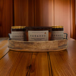 My Store hand-poured aroma candle collection in a wooden tray with Tobacco scent