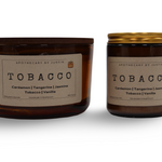 Two hand-poured aroma candles in Tobacco scent featuring notes of Cardamom and Vanilla