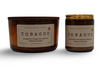 Two hand-poured aroma candles in Tobacco scent featuring notes of Cardamom and Vanilla