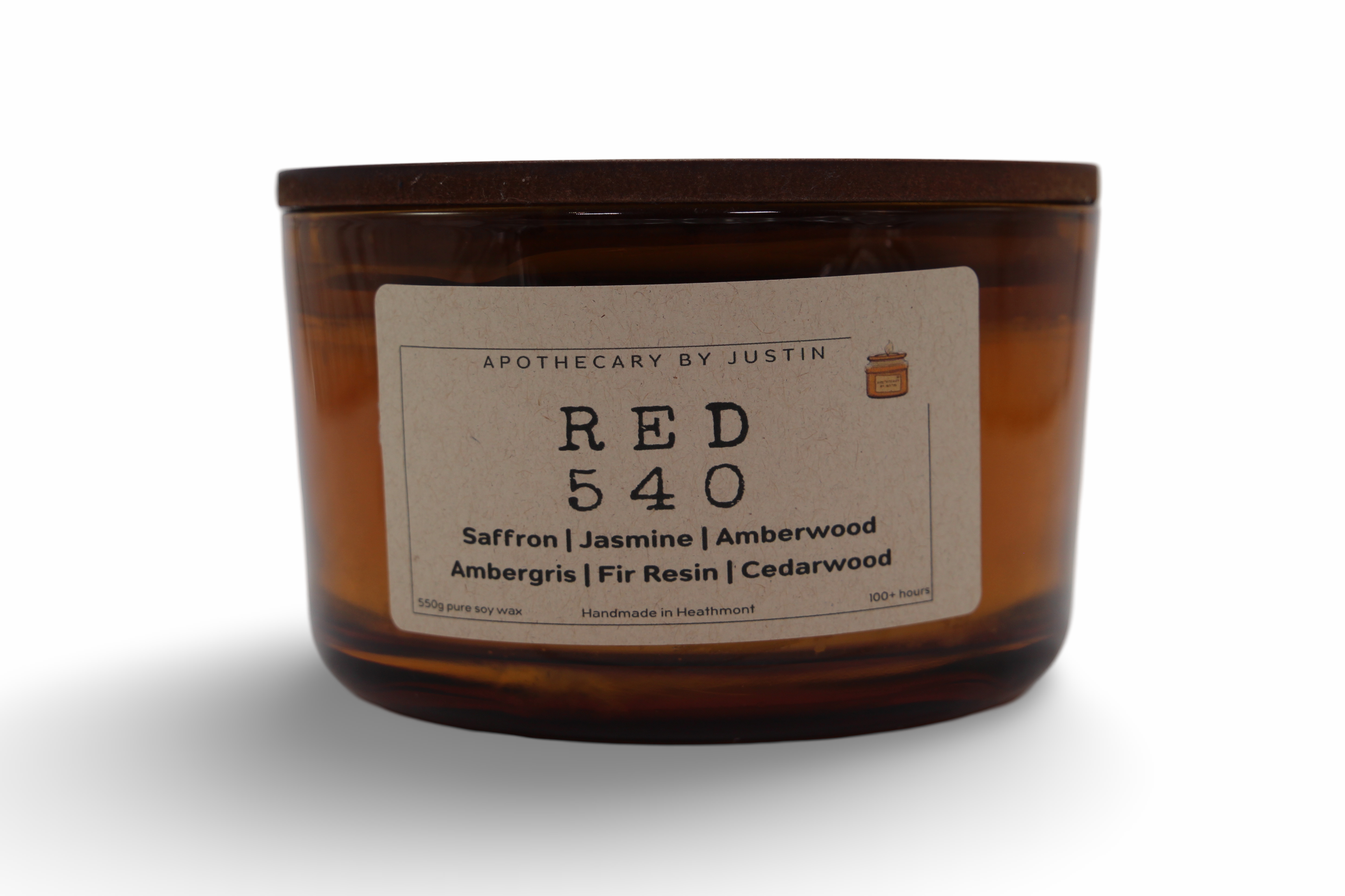 My Store hand-poured scented candle in amber glass with saffron, jasmine, and amberwood fragrance