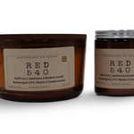 Hand-poured scented candle set featuring saffron, jasmine, and amberwood scents in amber jars
