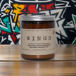 Wings handcrafted candle by Apothecary by Justin with notes of bergamot, praline, and patchouli in Australia