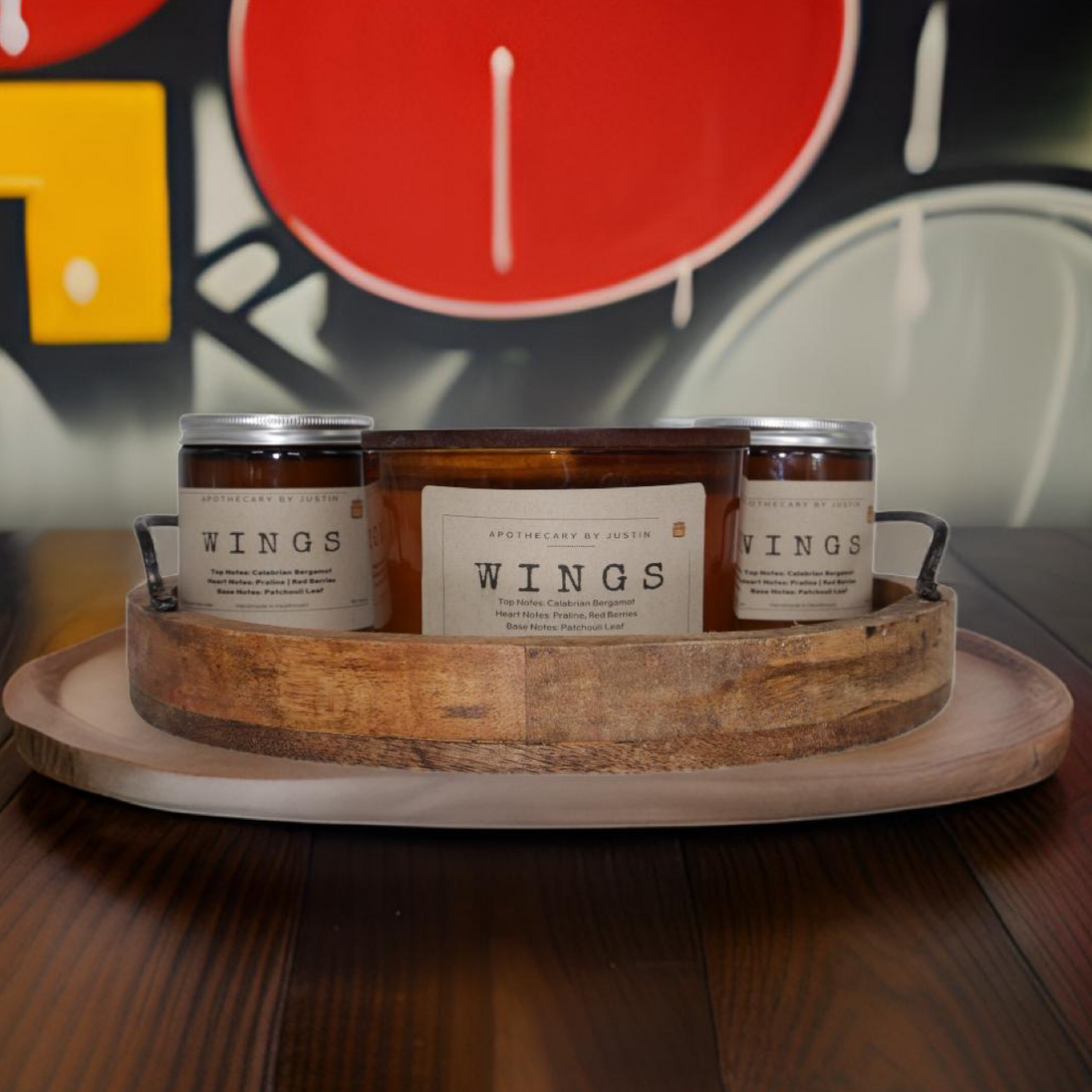 Set of handcrafted candles Australia displayed on a wooden tray with a rustic design