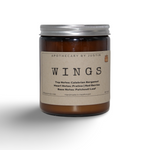 My Store handcrafted vegan candle named Wings in a glass jar with notes of bergamot and patchouli