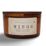 My Store handcrafted vegan candle in amber jar with Wings scent and earthy notes