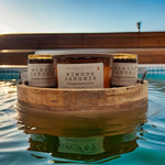 Mimosa Sangria candle online with fruity scents of pineapple, berries, and citrus in a rustic wooden holder