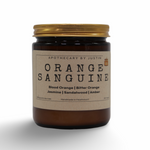 Orange Sanguine candle in amber jar featuring blood orange, jasmine, and sandalwood for purchase