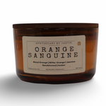 Orange Sanguine candle purchase featuring blood orange, jasmine, and sandalwood scent in a stylish jar