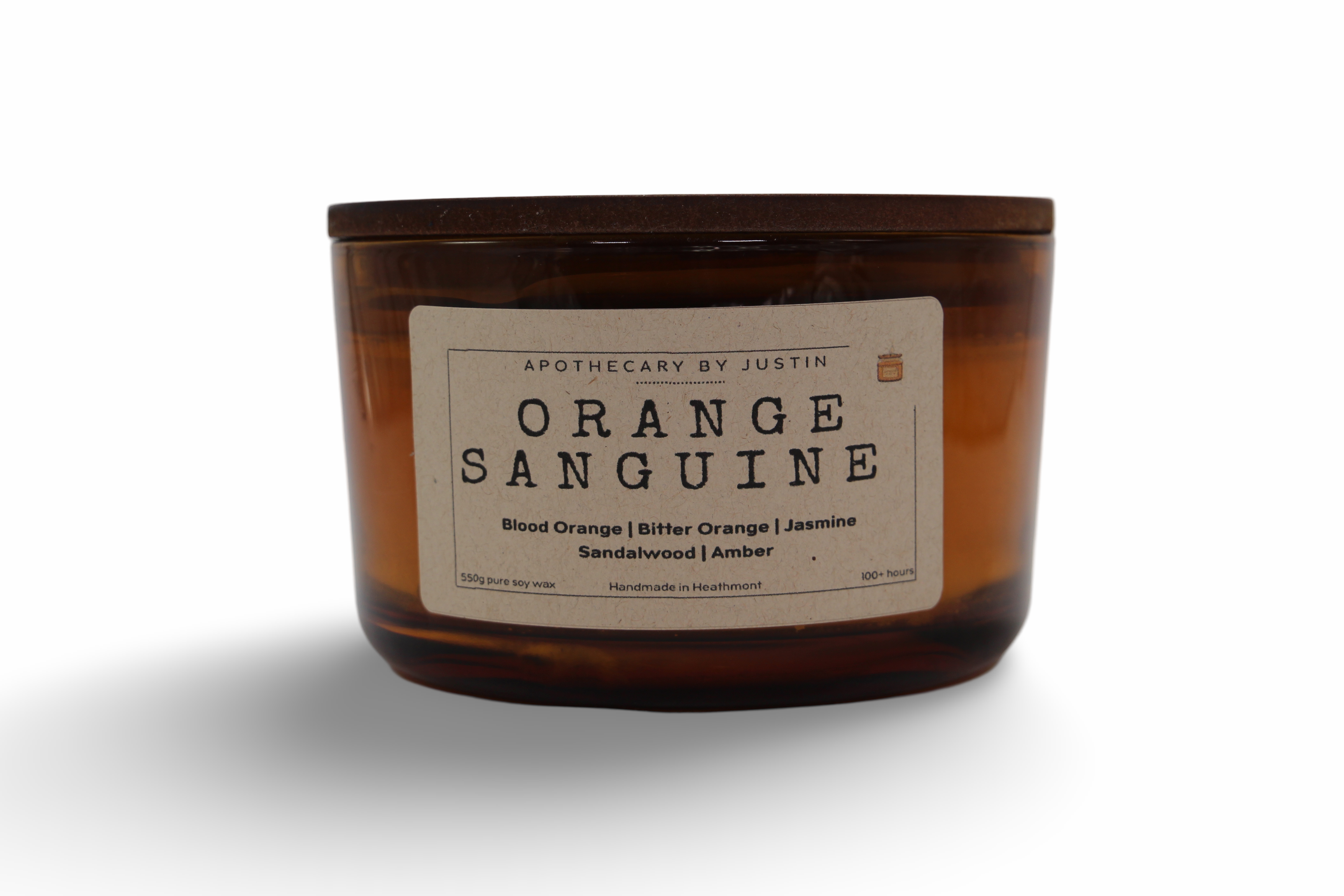 Orange Sanguine candle purchase featuring blood orange, jasmine, and sandalwood scent in a stylish jar