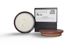 My Store prosperous scented candle in a sleek black container with a wooden lid and elegant packaging