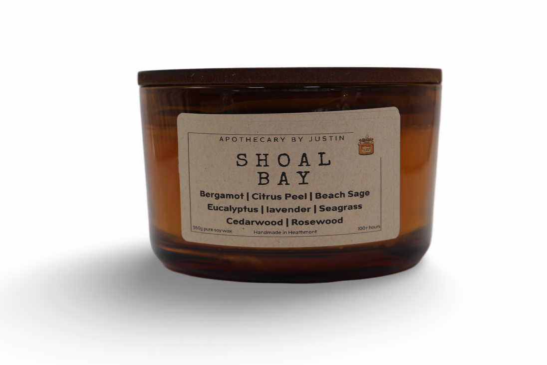 Shoal Bay aromatherapy candle with soothing scents of bergamot, lavender, and cedarwood in a glass jar