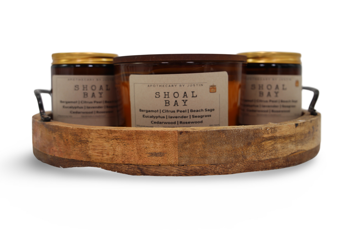 Shoal Bay aromatherapy candle trio displayed in a wooden tray with natural scents