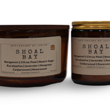 Shoal Bay aromatherapy candle in two sizes featuring bergamot, lavender, and cedarwood scents