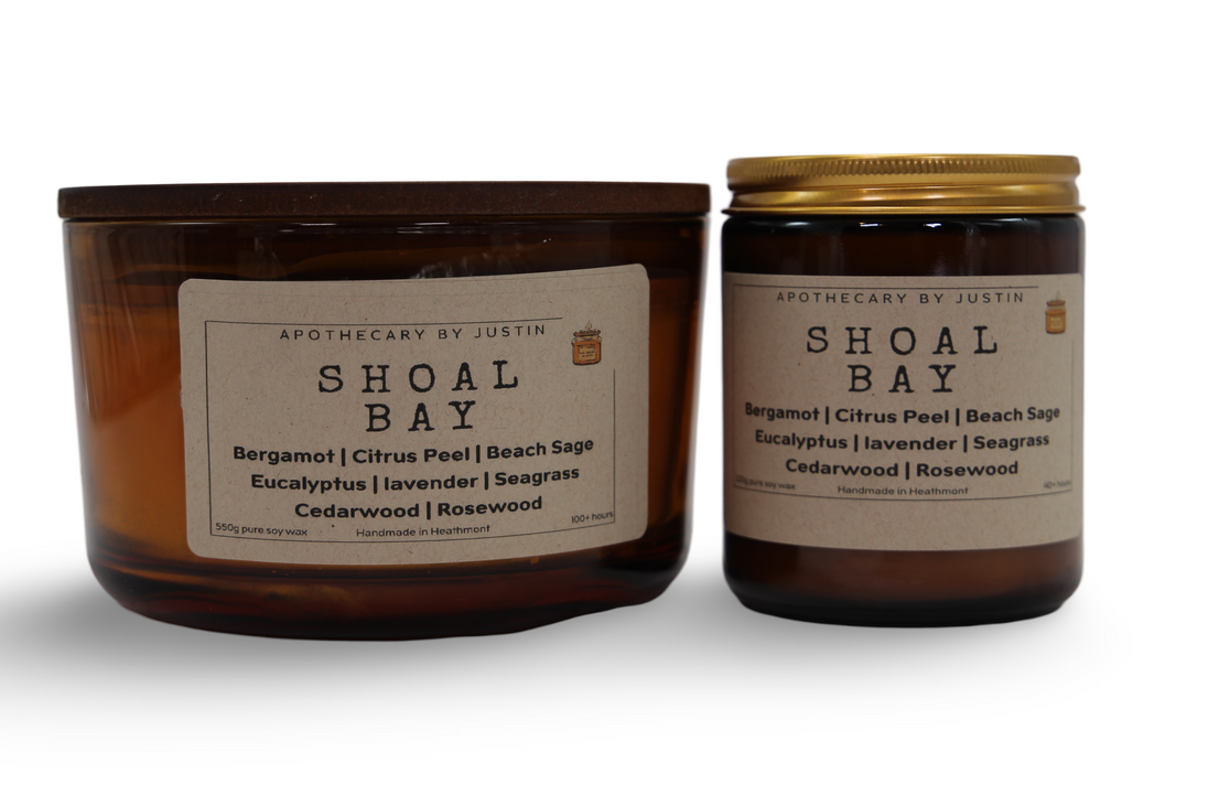 Shoal Bay aromatherapy candle in two sizes featuring bergamot, lavender, and cedarwood scents