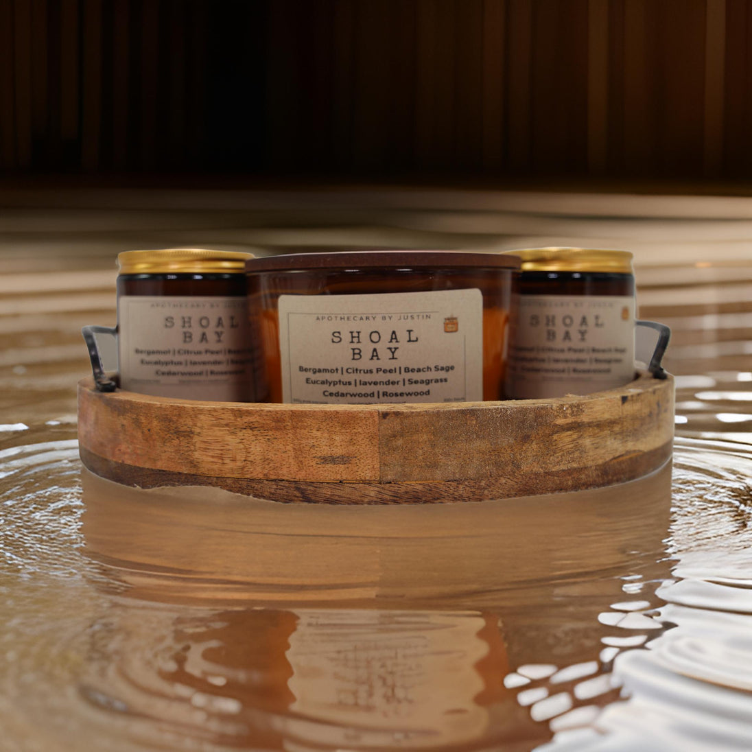 Shoal Bay aromatherapy candle set in a wooden tray, featuring soothing scents for relaxation