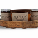Strong hot-throw candles in Tropical Delight scent featuring lychee, peach, coconut, and vanilla