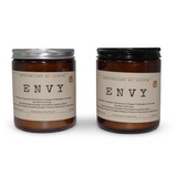 Vegan soy candles hand-poured in amber jars with eco-friendly packaging for a calming ambiance