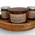 My Store musk rosewood candle in a decorative wooden tray with assorted scents