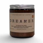 My Store musk rosewood candle in a glass jar with a simple label and natural scent blend