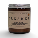 My Store musk rosewood candle in a glass jar with a simple label and natural scent blend