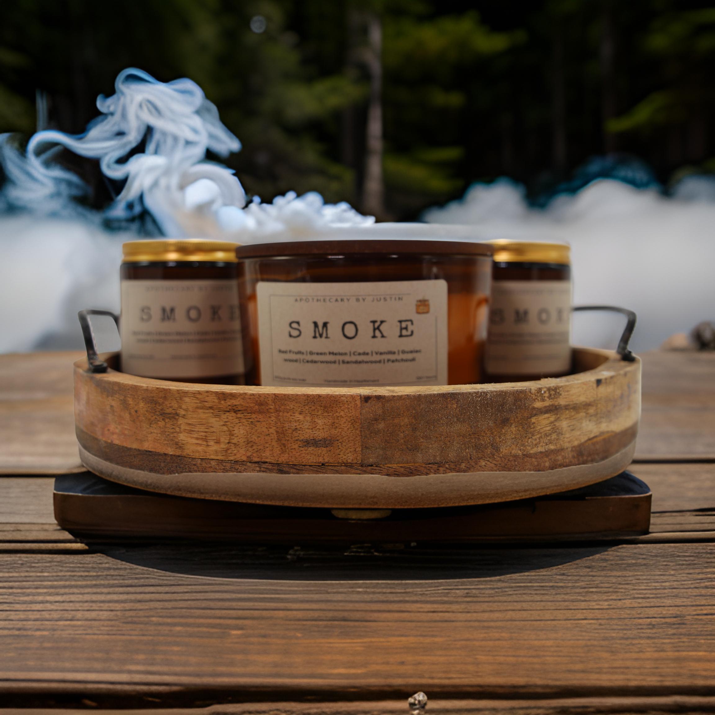 Eco-friendly home fragrance kit featuring three scented candles in a rustic wooden tray