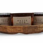 Set of My Store strong hot-throw amber candle in a wooden tray featuring fragrant white oud scent