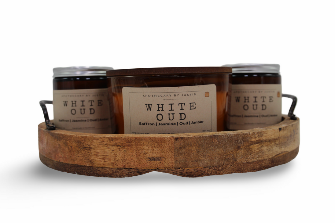 Set of My Store strong hot-throw amber candle in a wooden tray featuring fragrant white oud scent