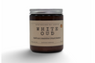 My Store strong hot-throw amber candle in a glass jar with a stylish label and lid